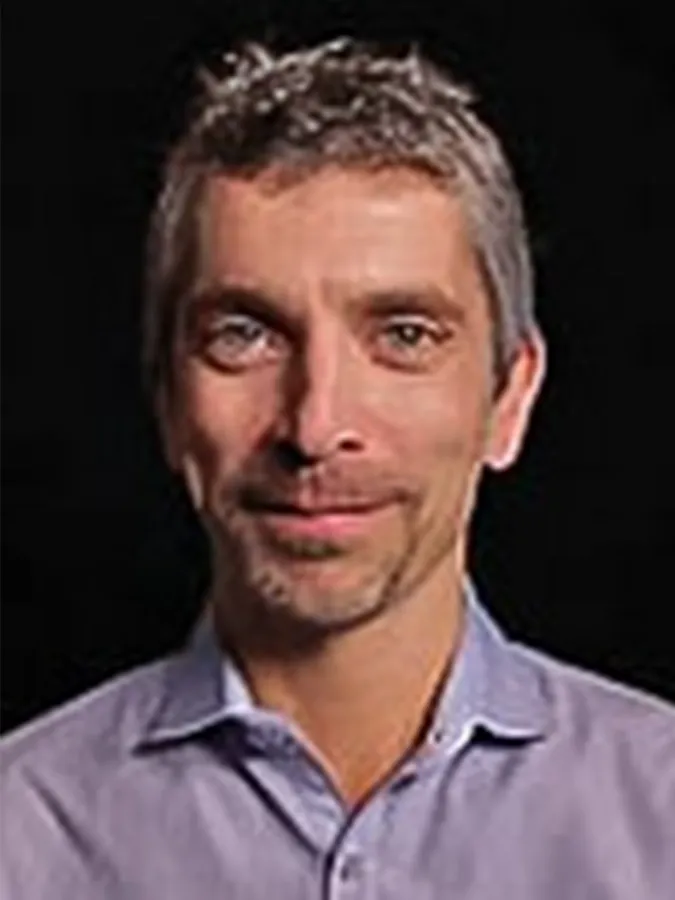 Portrait of Dr. Graeme C. Reid.
